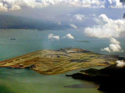 http://upload.wikimedia.org/wikipedia/commons/2/24/View_of_HK_Airport_from_air.JPG