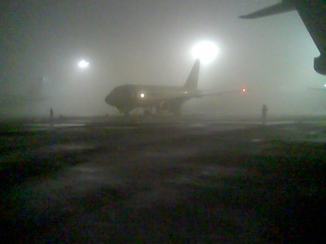 de madrugada con mucha niebla (despejandose)