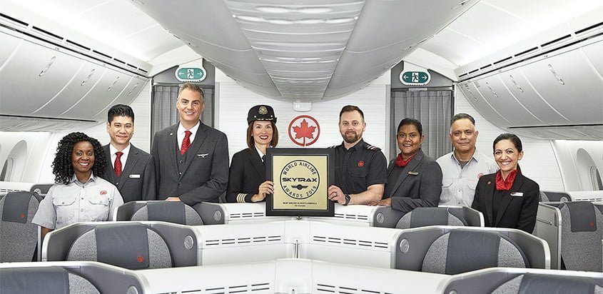 Tripulación de Air Canada con el reconocimiento de Skytrax.